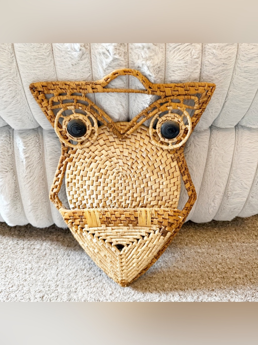 Vintage MCM 1970s woven wicker and rattan owl wall pocket.